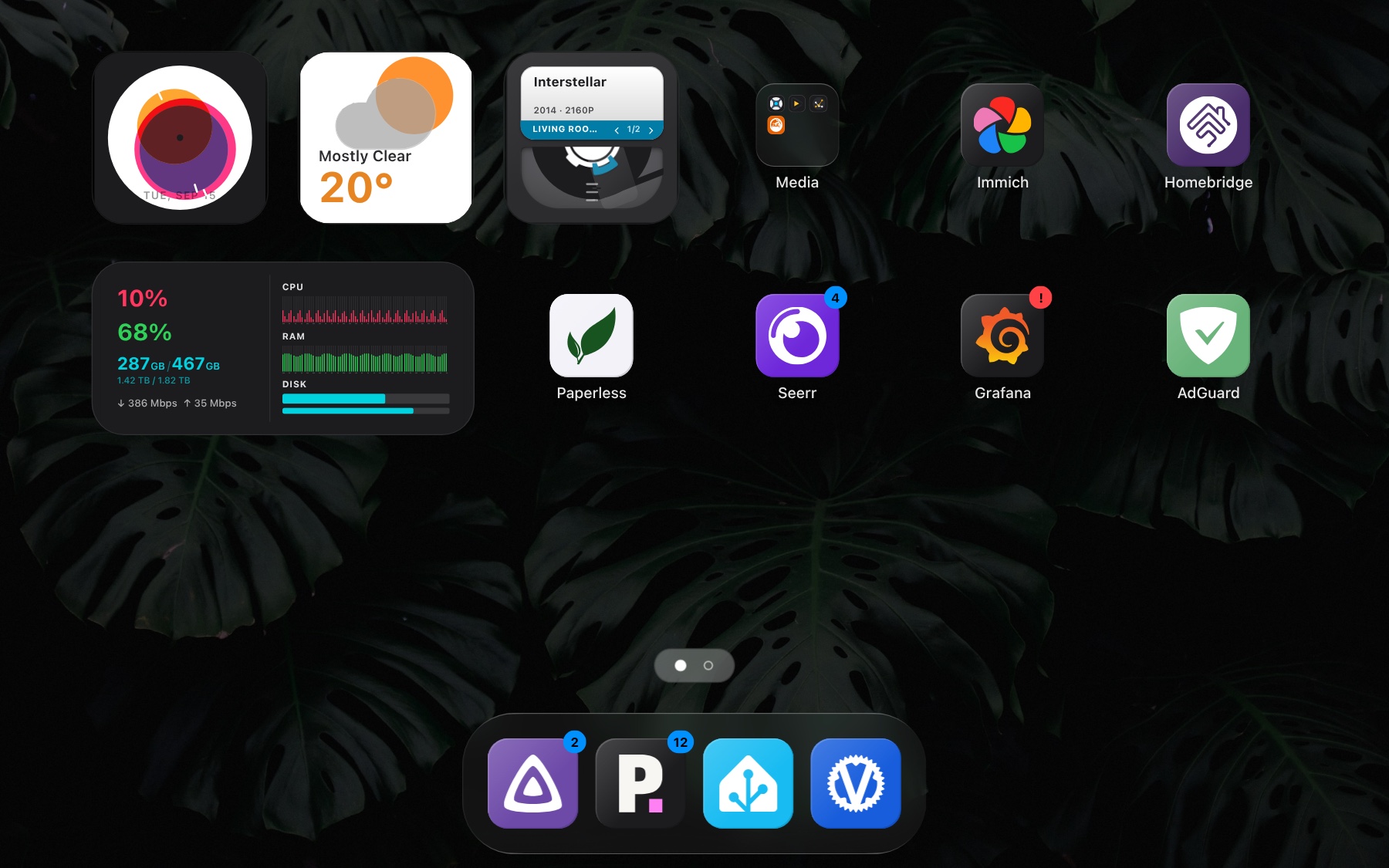 The Stackyard dashboard, with widgets, app tiles, a folder and the dock.